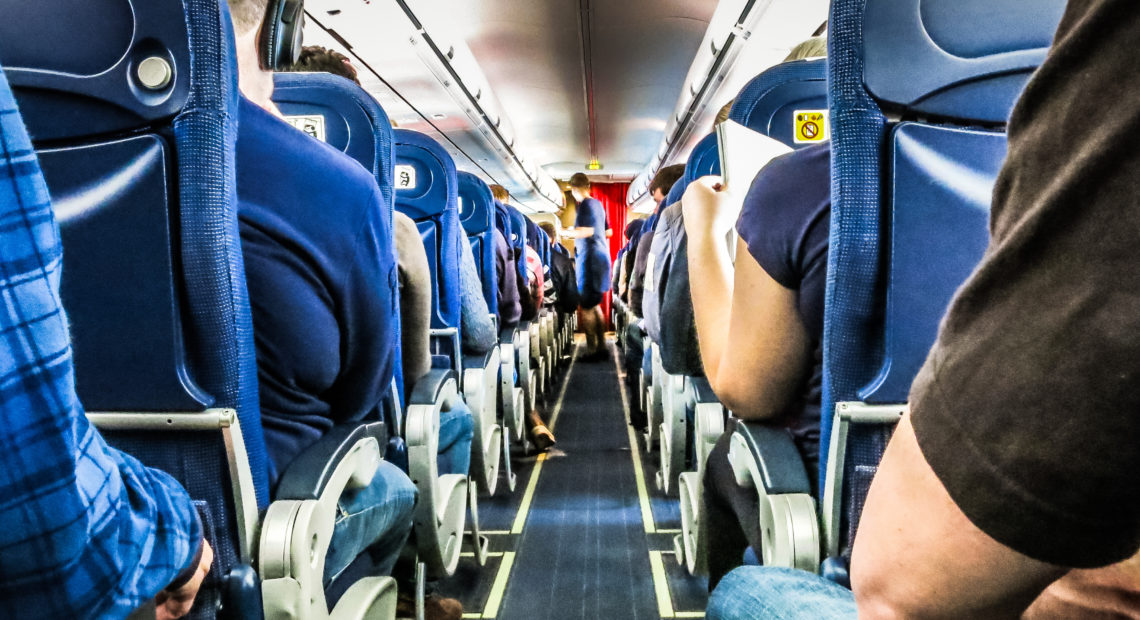 cramped leg room picture on airplane