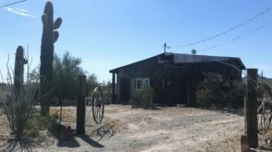 Humanitarian activists use "the barn," in Ajo, to help people coming across the nearby border with Mexico. Warren found the two men hiding in the barn's bathroom, the government says. CREDIT: RYAN LUCAS/NPR