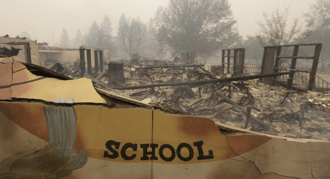 The burned remains of Paradise Elementary School is seen Friday, in Paradise, Calif. Authorities say a wildfire has all but destroyed the Northern California town. CREDIT: Rich Pedroncelli/AP