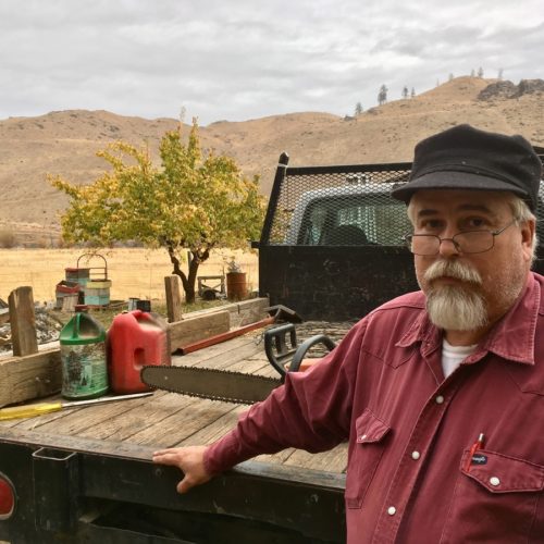 Rancher Dave Creveling believes the cost of a new Washington state carbon fee would be passed along to rural people like him if voters approve it. CREDIT: ASHLEY AHEARN