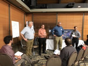 Hanford managers broke off into small topic groups to discuss the site and answer questions from the crowd Thursday night in Hood River, Ore. CREDIT: ANNA KING/N3