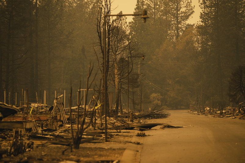 A neighborhood is decimated by the Camp Fire in Paradise, Calif. CREDIT: Mason Trinca/The Washington Post/Getty Images