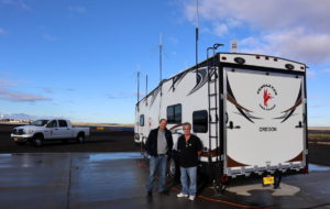 Pendleton UAS range manager Darryl Abling and airport manager Steve Chrisman next to their mobile mission control RV. CREDIT TOM BANSE / N3