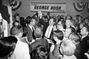 Bush celebrates after winning the U.S. House seat for Texas' 7th District in 1966. CREDIT: Ed Kolenovsky/AP