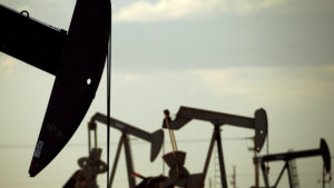 The recent drop in oil prices has raised concerns about the international economy, as well as domestic growth in the United States. CREDIT: Charlie Riedel/AP