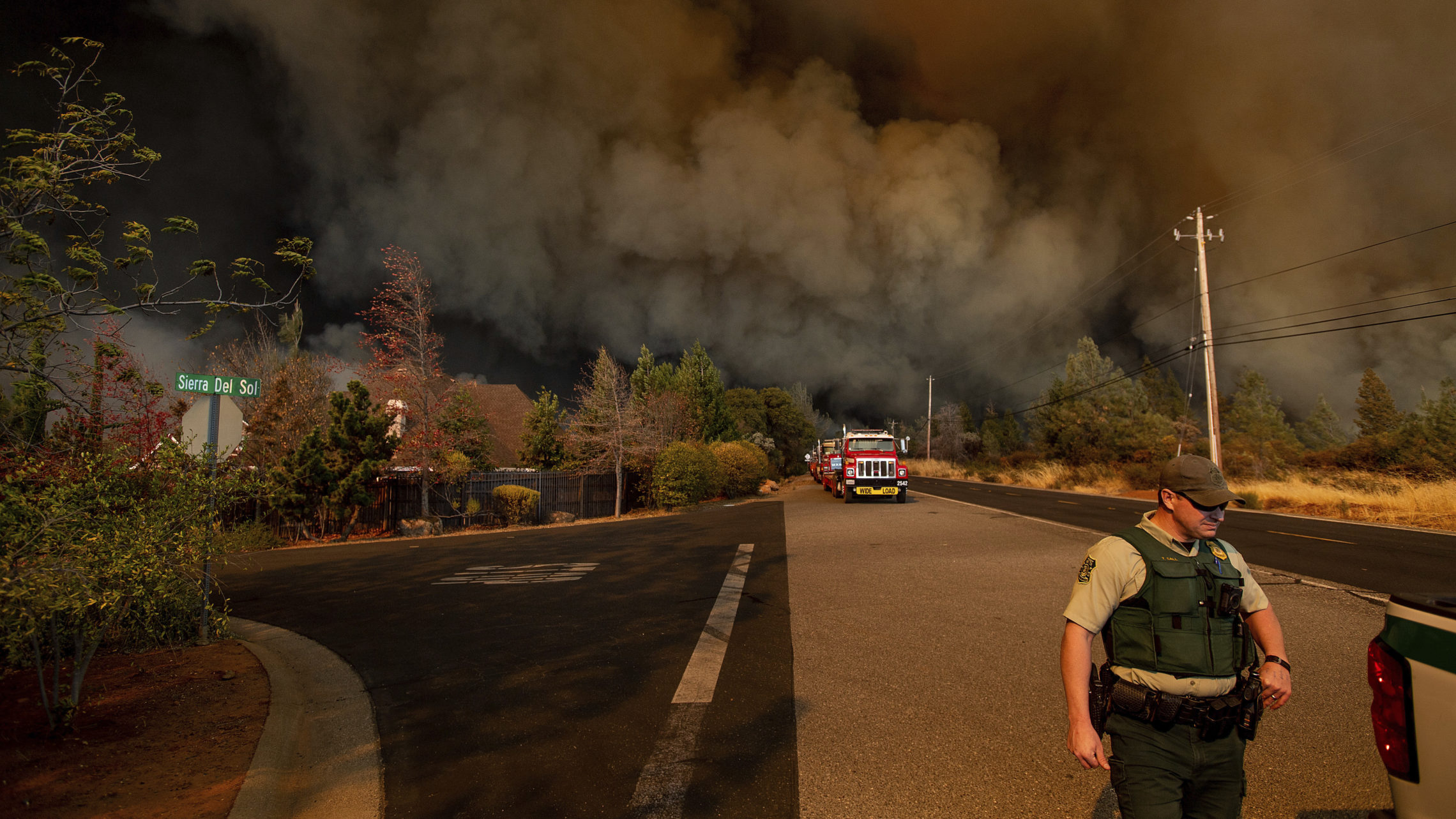 The Camp Fire rages through Paradise, Calif., on Thursday. CREDIT: Noah Berger/AP