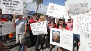 Crowds gathered outside of the Broward County Supervisor of Elections this week in Florida. The elections for governor and U.S. Senate are heading for recounts. CREDIT: Joe Skipper/AP