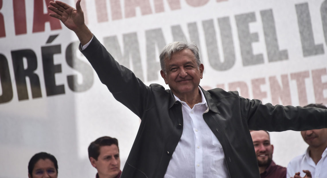 Mexican President-elect Andrés Manuel López Obrador waves to supporters during his national tour to thank those who voted for him in the July 1 elections, at the Plaza de las Tres Culturas in Mexico City, in late September. CREDIT: Rodrigo Arangua/AFP/Getty Images