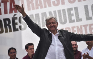 Mexican President-elect Andrés Manuel López Obrador waves to supporters during his national tour to thank those who voted for him in the July 1 elections, at the Plaza de las Tres Culturas in Mexico City, in late September. CREDIT: Rodrigo Arangua/AFP/Getty Images