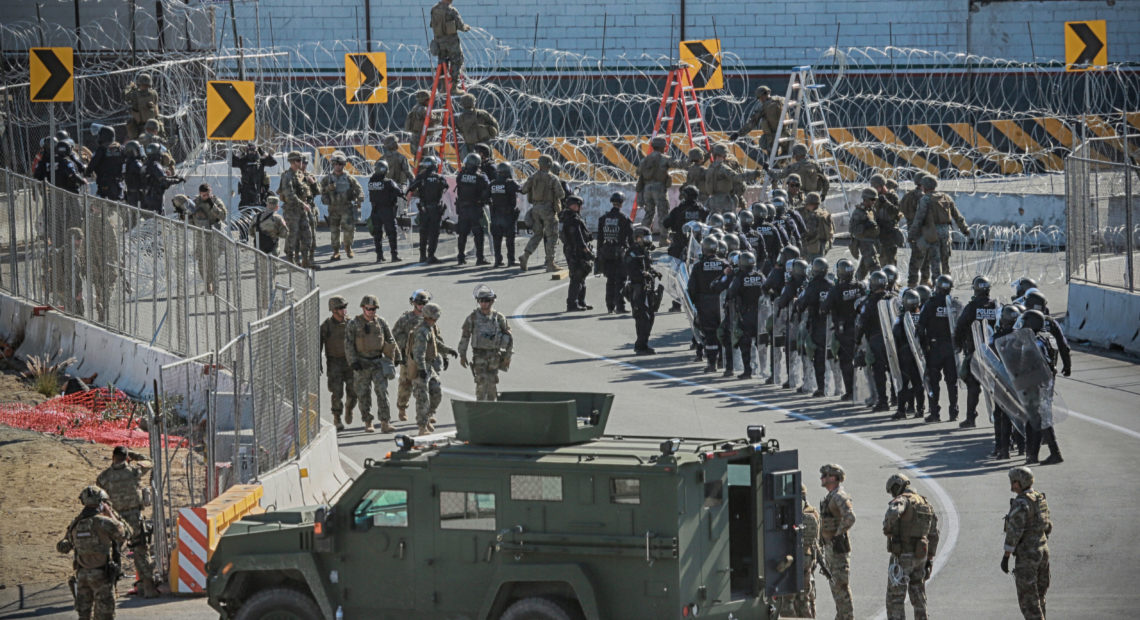 U.S. military and border agents secure the United States-Mexico border at the San Ysidro border crossing south of San Diego, Calif. on Nov. 25. CREDIT: Sandy Huffaker/AFP/Getty Images