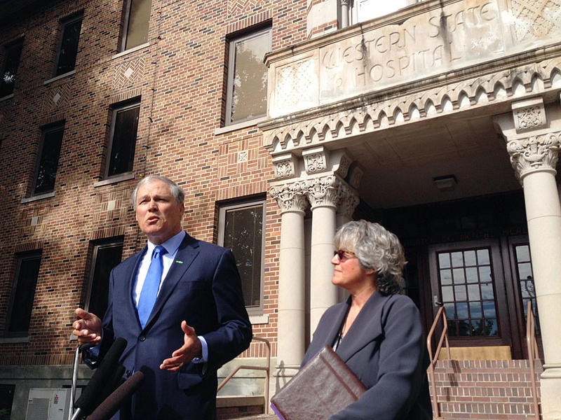 Washington Gov. Jay Inslee, pictured here outside Western State Hospital, is proposing the state explore building a new state hospital. CREDIT: AUSTIN JENKINS / NORTHWEST NEWS NETWORK