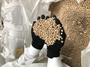 Dry garbanzo beans spill between Phil Hinrichs’ fingers. Hinrichs Trading Co. readys chickpeas for hundreds of products on domestic store shelves and exports the commodity in bulk across the globe. Wrinkled chickpeas are particularly good quality, he explains, they puff up better. CREDIT: ANNA KING/N3