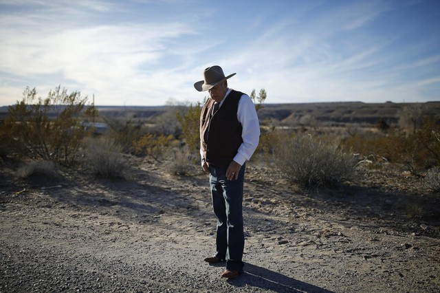 Rancher Cliven Bundy stands along the road near his ranch Jan. 27, 2016, in Bunkerville, Nevada. CREDIT: JOHN LOCHER/AP