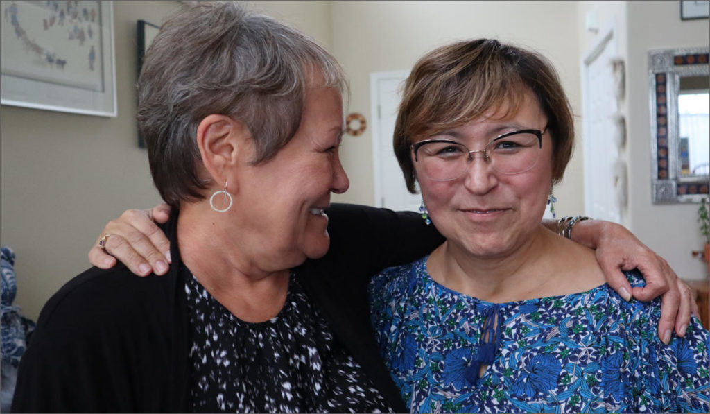 Sisters Elsie Boudreau, right, and Florence Busch grew up in St. Mary's, a tiny Alaska Native village in Western Alaska. Both of them worked at KNOM, a Catholic mission radio station in Nome, Alaska. Elsie filed a lawsuit against the Jesuit priest who founded the station in 2003. CREDIT: EMILY SCHWING/N3