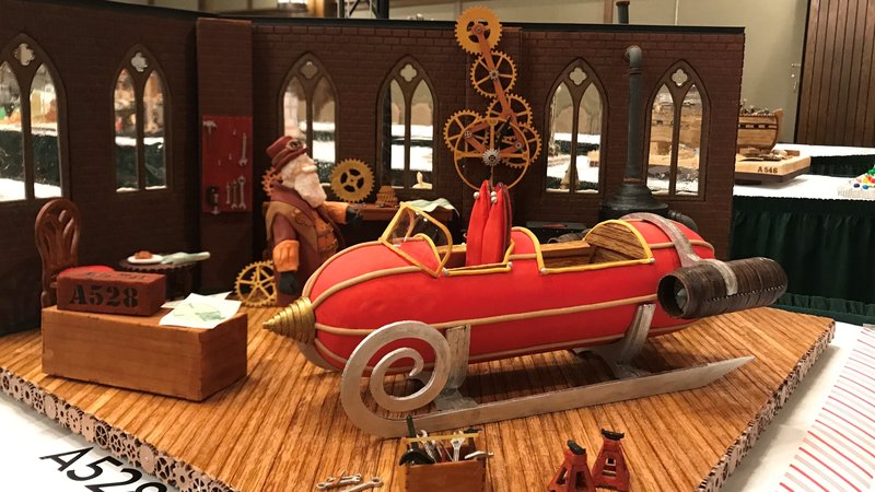 For this year's grand prize winner, the judges were impressed by the intricate, working gingerbread gears of the clock inside Santa's workshop. Kristen Hartke/NPR