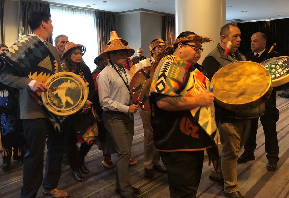 Representatives of Washington tribes perform a "paddle song" at the start of a hearing in Victoria, B.C., on the Trans Mountain Pipeline. CREDIT: NATIONAL ENERGY BOARD