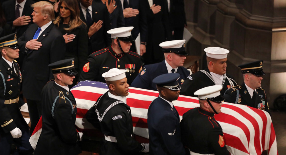 A military honor guard carries the casket of former President George H.W. Bush during the funeral at the National Cathedral in Washington, D.C. CREDIT: CHERYL DIAZ MEYER/NPR