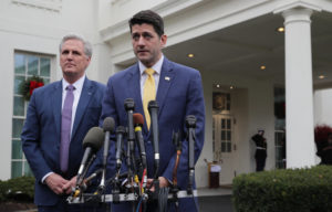 Speaker of the House Paul Ryan, R-Wis. (right), and House Majority Leader Kevin McCarthy, R-Calif., talk to journalists after meeting with President Trump at the White House on Thursday about a deal to fund the government. CREDIT: CHIP SOMODEVILLA/GETTY IMAGES