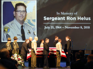 The casket of Ventura County Sheriff Sgt. Ron Helus arrives on stage for a memorial service on Nov. 15 in Westlake Village, Calif. CREDIT: Al Seib/Getty Images