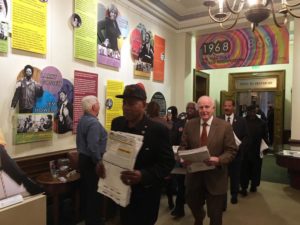 I-1000 sponsor Nat Jackson and former Gov. Dan Evans lead a parade of supporters with petitions into the Washington Secretary of State's Office CREDIT: AUSTIN JENKINS / NW NEWS NETWORK