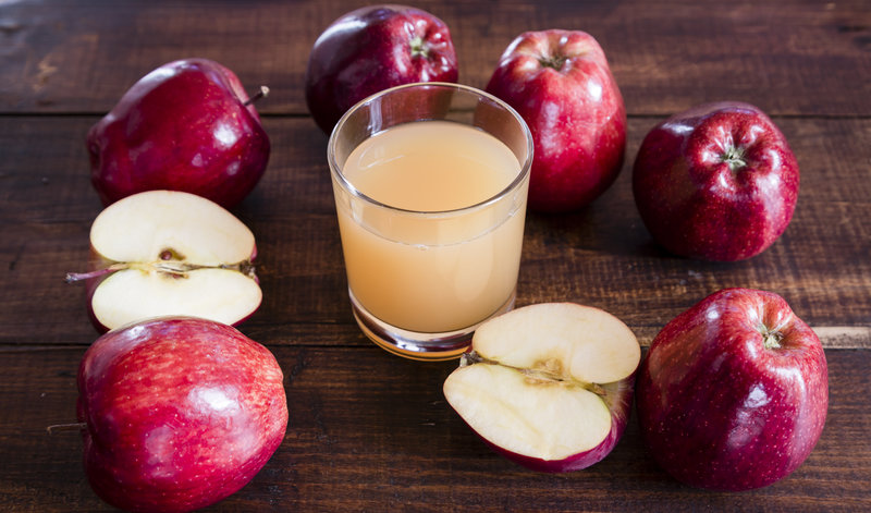 Traces of cadmium, lead and arsenic have been discovered in many brands of apple and other fruit juices. CREDIT: Westend61/Getty Images