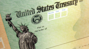 The White House says tax refund checks will go out despite the partial government shutdown. CREDIT: Matt Rourke/AP