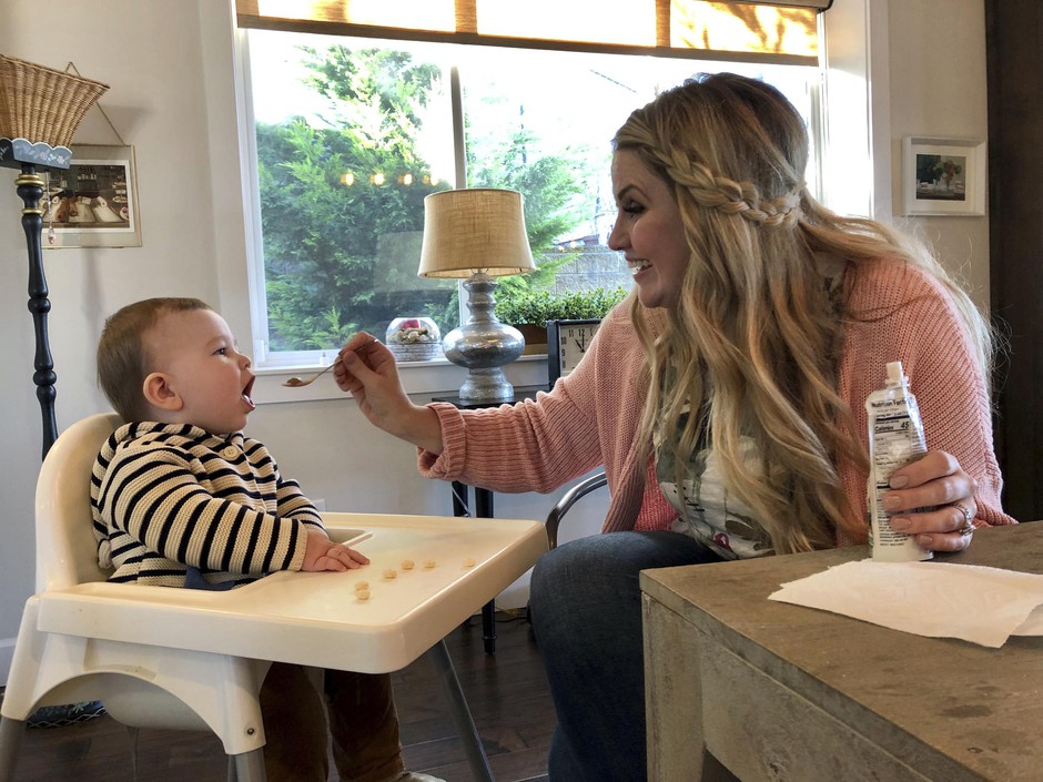 Jocelyn Smith cares for her 11-month-old son, Mason at their home in Camas, Washington, on Wednesday, Jan. 30, 2019. Smith has been afraid to take Mason out of the house during a measles outbreak in southwest Washington because he is too young to receive the measles vaccine. CREDIT: GILLIAN FLACCUS/AP