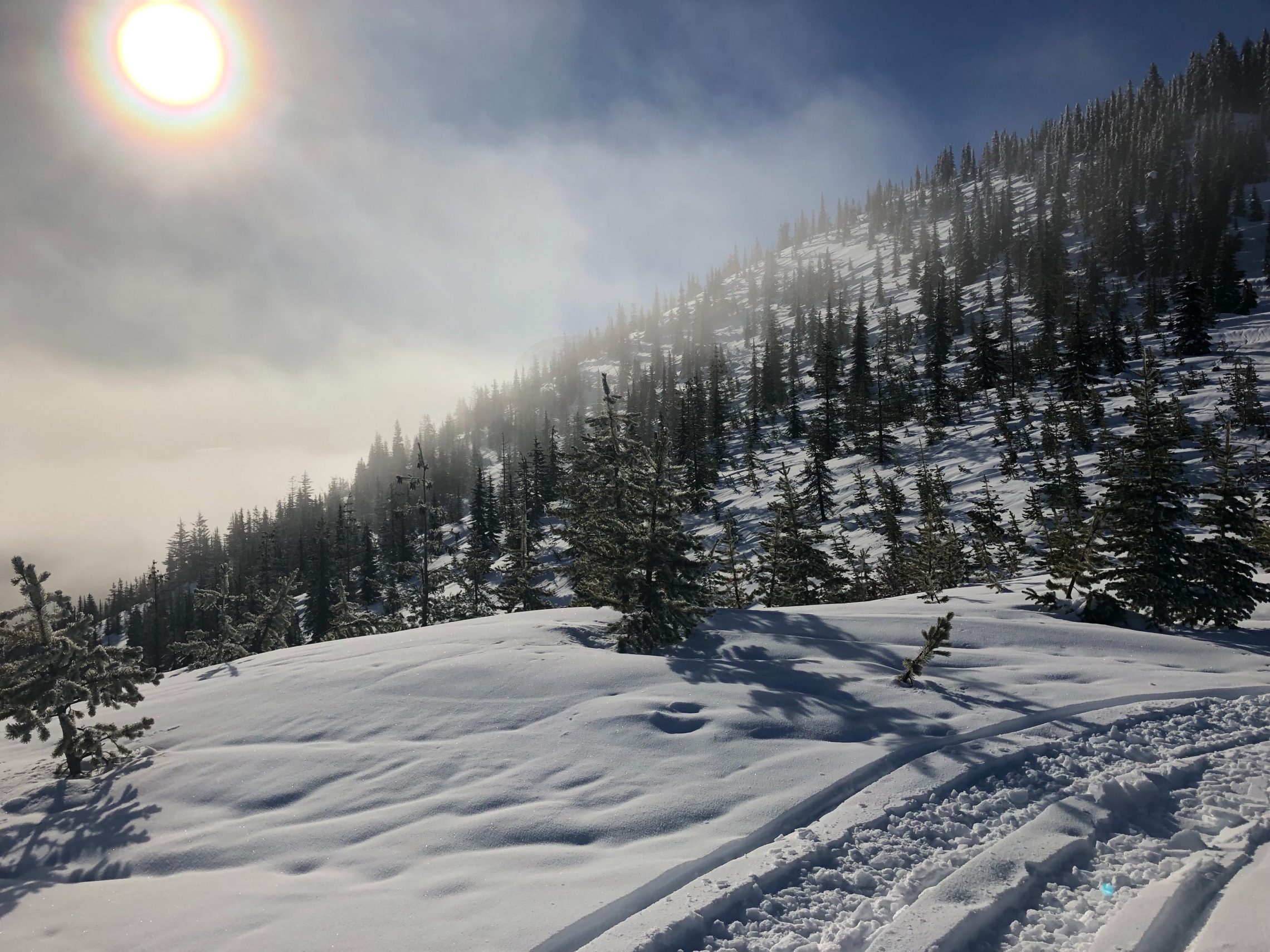 The 2018-19 Northwest snowpack isn’t as robust as water managers would like. At high-elevation near Mt. Adams, creases in the snowpack reveal where rain has run downhill. CREDIT: GARY KING