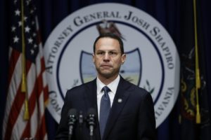 Pennsylvania Attorney General Josh Shapiro speaks about a 2018 grand jury report about the cover up of clergy sex abuse in diocese in the state. CREDIT: MATT ROURKE/AP