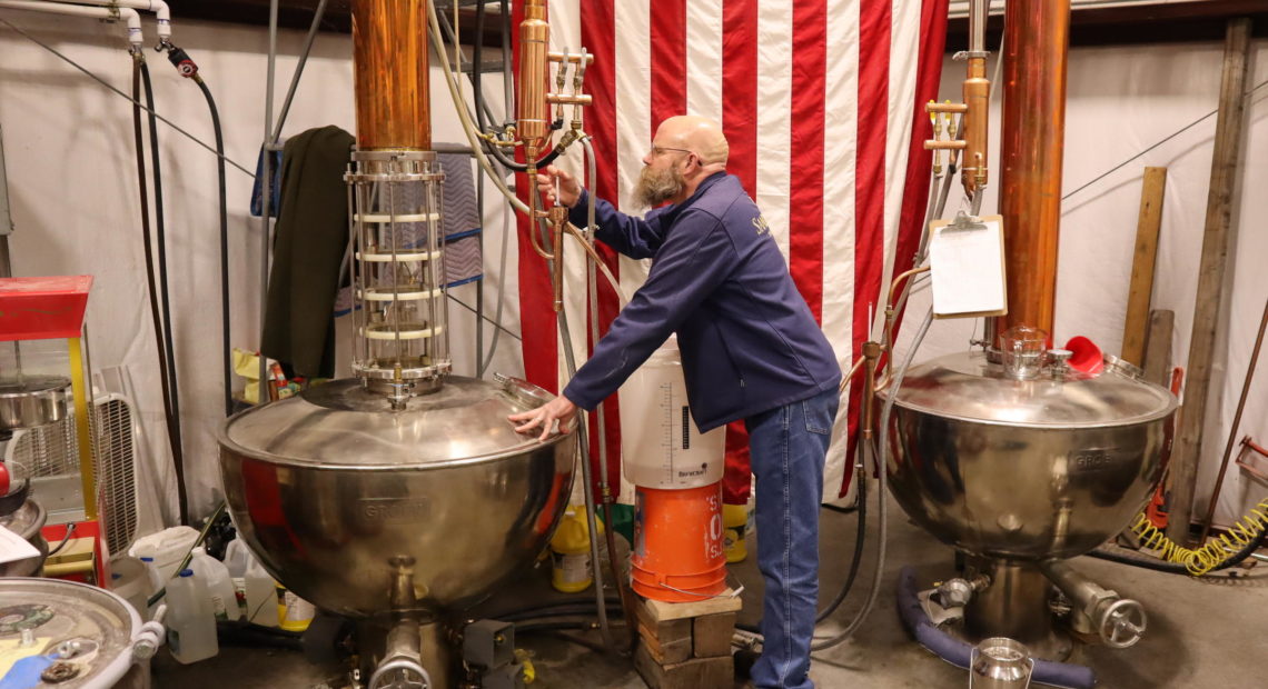 Sandstone Distillery owner John Bourdon wants his liquor to display the terroir of the grains it was made from. TOM BANSE / N3