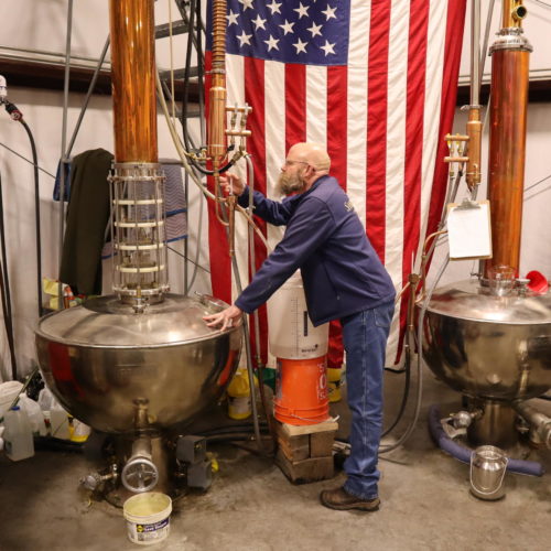 Sandstone Distillery owner John Bourdon wants his liquor to display the terroir of the grains it was made from. TOM BANSE / N3