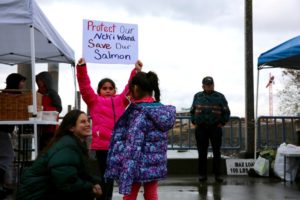 Allies and members of Yakama Nation hold a rally at the Vancouver Landing Amphitheater along the Columbia River. CREDIT: ERICKA CRUZ GUEVARRA/OPB
