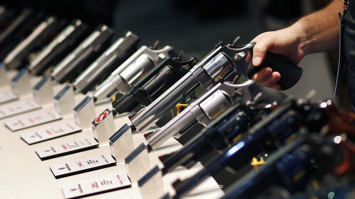 Handguns are displayed at a trade show in Las Vegas. The Supreme Court is granting a case on gun rights for the first time since 2010. CREDIT: JOHN LOCHER/AP