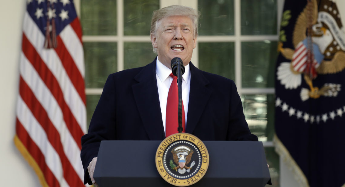 President Trump speaks in the Rose Garden of the White House on Friday, saying he will endorse a short-term spending deal to end the government shutdown. Evan Vucci/AP