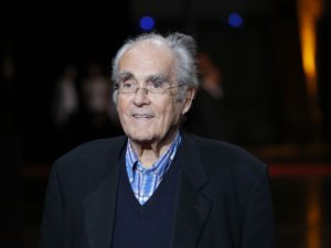 French composer Michel Legrand arrives at the opening ceremony of the 6th Lumiere Festival in 2014. Legrand died Saturday. Laurent Cipriani/AP