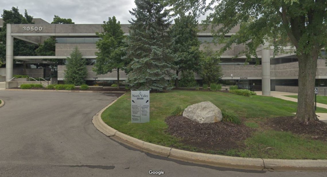 The "University of Farmington" occupied office space in this building in Farmington Hills, Mich. In court documents, eight men are accused of recruiting hundreds of "students" to the bogus school. CREDIT: GOOGLE MAPS