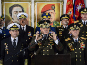 Flanked by other Venezuelan military leaders, Defense Minister Vladimir Padrino López expressed support for Nicolás Maduro on Thursday in the capital city, Caracas. CREDIT: LUIS ROBAYO/AFP/GETTY IMAGES