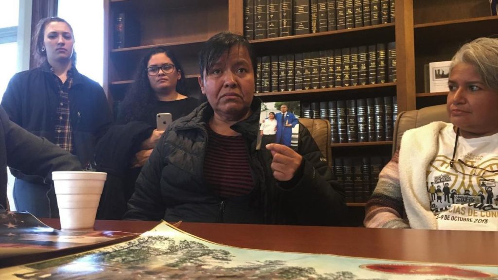 Maria Gomez-Velasquez holds a picture of her son Jilmar Ramos-Gomez. CREDIT: Dustin Dwyer/Michigan Radio