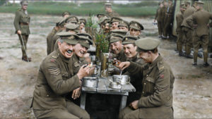 Peter Jackson restores archival footage of British soldiers enjoying a meal in the documentary They Shall Not Grow Old. Warner Bros. Pictures