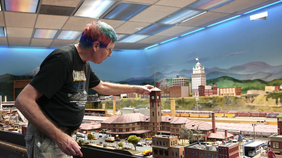 Club president Steven Watkins reset the clocks on the tower of Union Station, which was built to scale to the original architectural plans. CREDIT: NICK FISHER/OPB