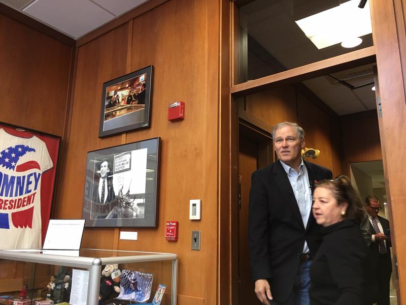 Gov. Jay Inslee enters a conference room at the New Hampshire Institute of Politics at Saint Anselm College where he spoke to students in January. CREDIT: AUSTIN JENKINS/N3