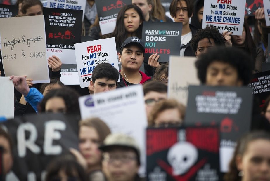 As the anniversary of the school shooting in Parkland, Florida approaches, Washington officials are looking at numerous new school safety measures. Here Seattle students observed a moment of silence during the March 14, 2018 school walkout. CREDIT: MEGAN FARMER/KUOWAs the anniversary of the school shooting in Parkland, Florida approaches, Washington officials are looking at numerous new school safety measures. Here Seattle students observed a moment of silence during the March 14, 2018 school walkout. CREDIT: MEGAN FARMER/KUOW