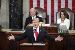 President Trump delivers his State of the Union address Tuesday to a joint session of Congress on Capitol Hill in Washington, as Vice President Pence and Speaker of the House Nancy Pelosi, D-Calif., watch.
