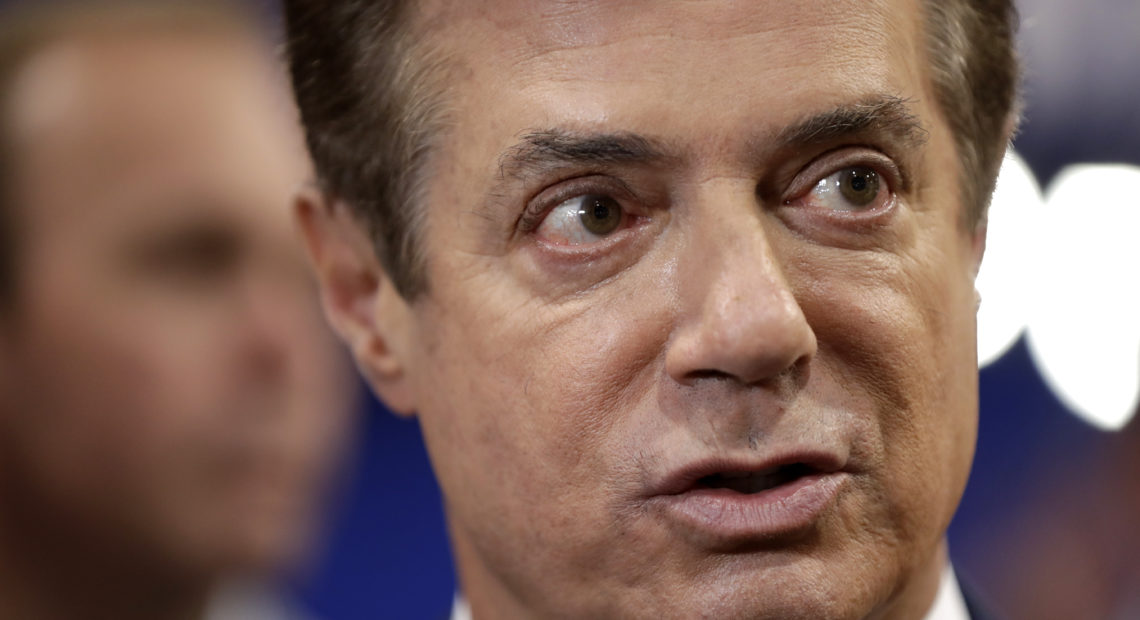 Former Trump campaign chairman Paul Manafort talks to reporters on the floor of the Republican National Convention in 2016. Prosecutors say Manafort "brazenly violated the law." CREDIT: Matt Rourke/AP