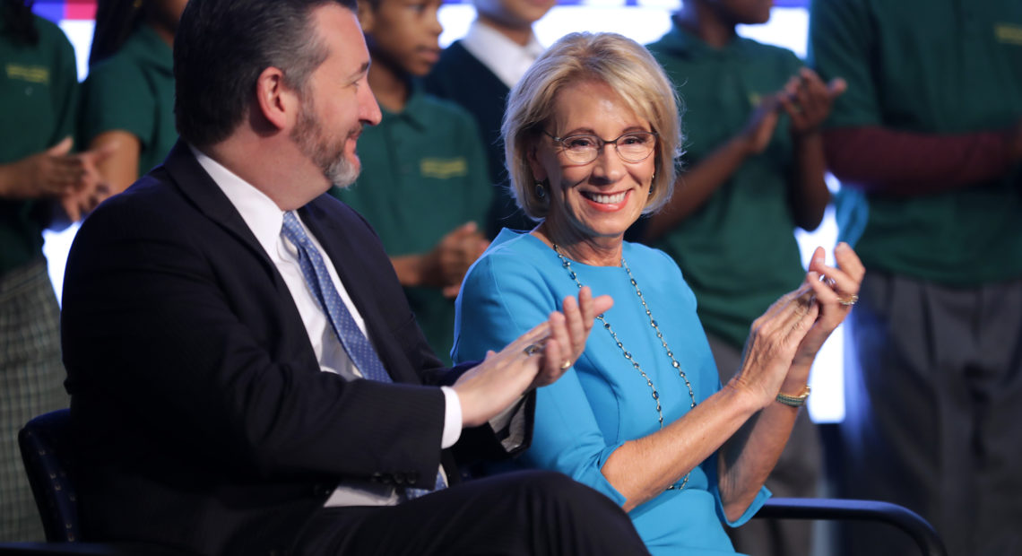 Education Secretary Betsy DeVos and Sen. Ted Cruz announced their proposal for Education Freedom Scholarships on Thursday. The scholarships would allow students to attend private schools or take part in apprenticeships, among other things. CREDIT: Chip Somodevilla/Getty Images
