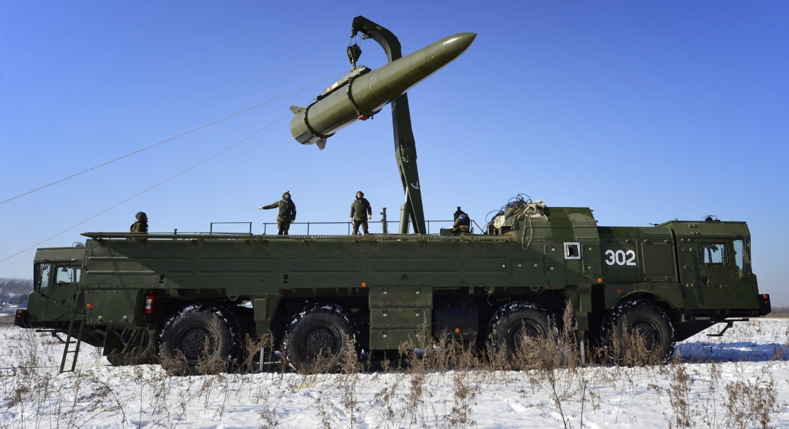 Russian troops load a missile onto an Iskander-M launcher during a 2016 exercise. Russia is now deploying missiles to Kaliningrad, its Baltic exclave. CREDIT: YURI SMITYUK/TASS