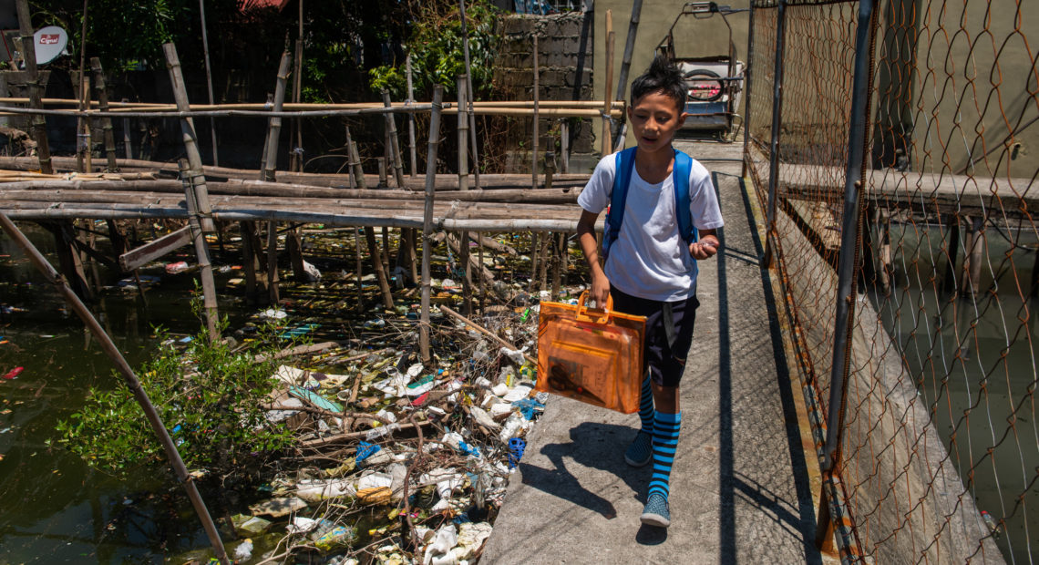 Around the globe, people are searching for ways to reduce plastic waste. Above: Dampalit, a fishing community in Manila Bay, can't keep up with a constant influx of trash. CREDIT: JES AZNAR/NPR