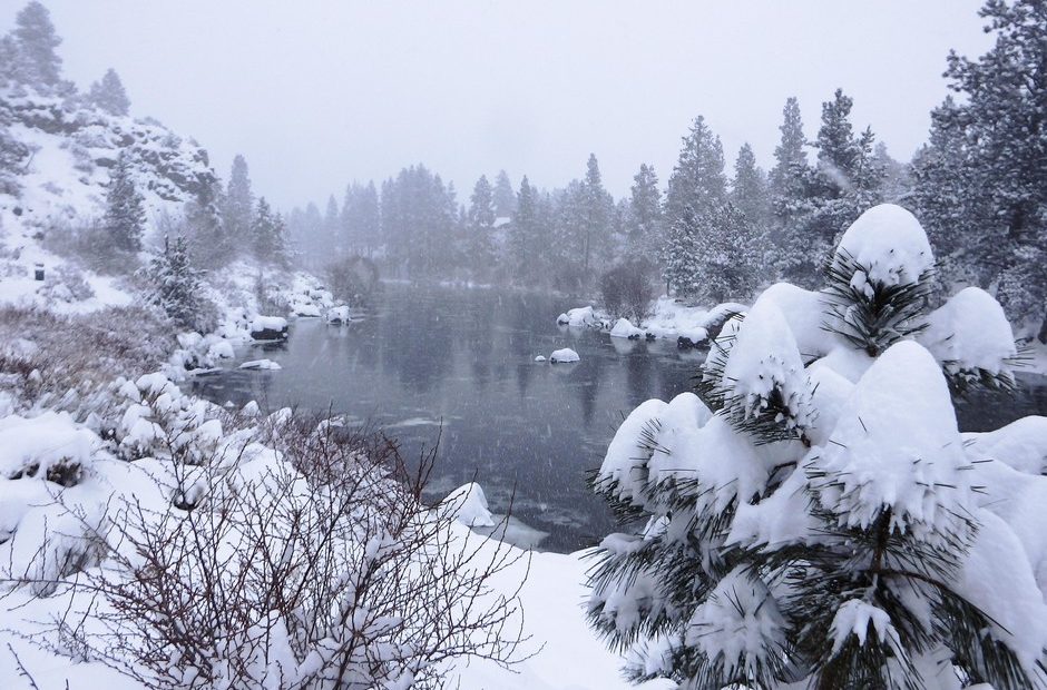 A view of the Deschutes River near First Street rapids in Bend, after a winter storm dumped over a foot of snow overnight on February 25, 2019. CREDIT: EMILY CURETON/OPB