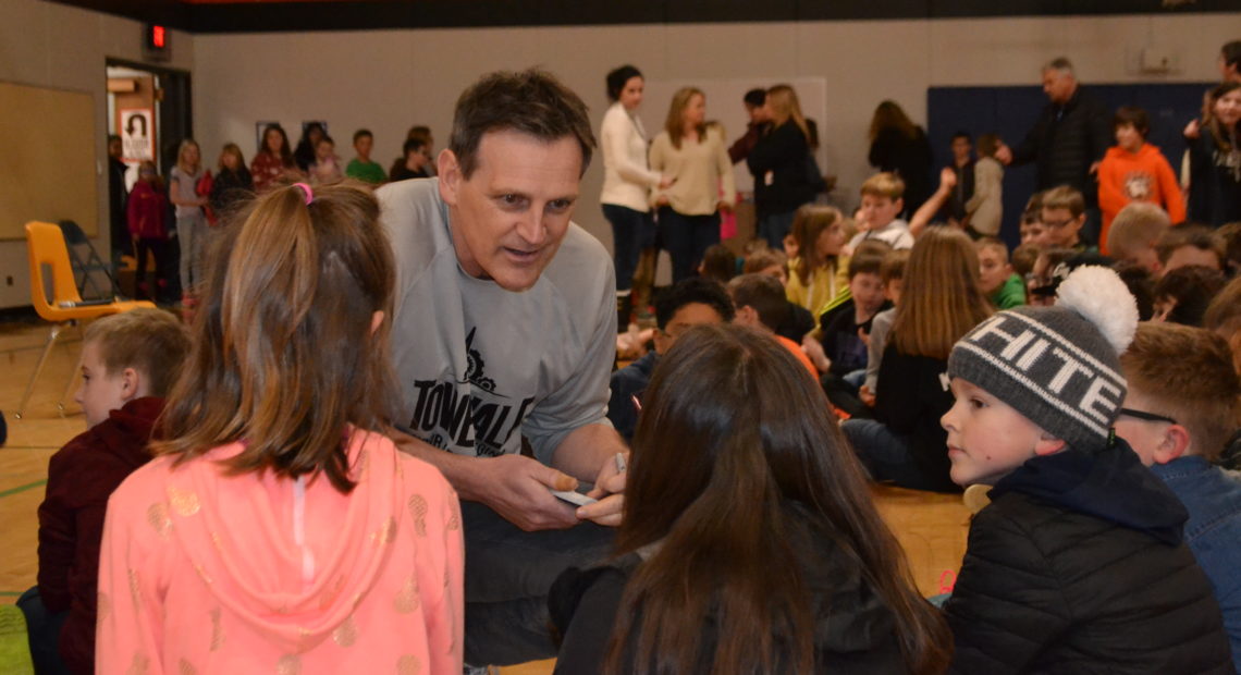 Author Patrick Carman visits with kids.