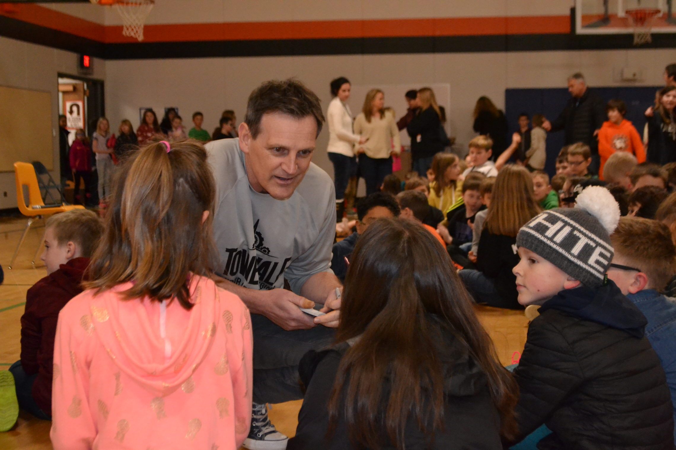 Author Patrick Carman visits with kids.